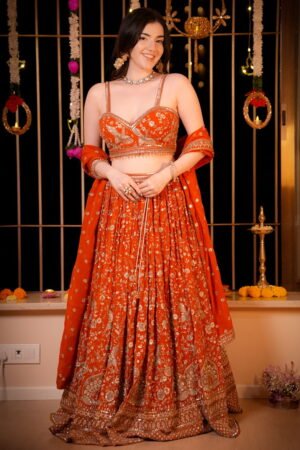 Rust Orange Lehenga Set With All Over Go...