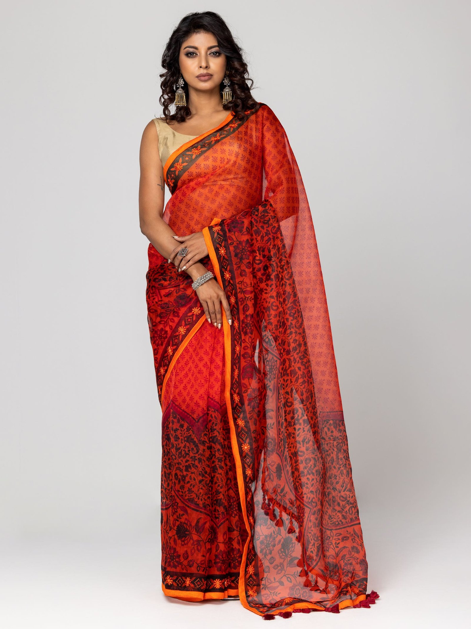 Dark Orange Printed And Embroidered Muslin Saree