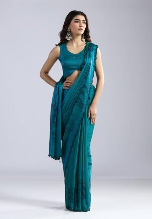Teal Radiance Hand-Printed Organza Saree With Scalloped Beadwork