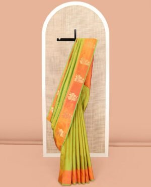Parrot Green Kanchipuram Silk Saree, Beautifully Designed With Zari Buttas, Complemented By A Contrast Border Of Floral Zari Designs, Pallu Adorned With Manga Designs, And Paired With A Contrast Blouse