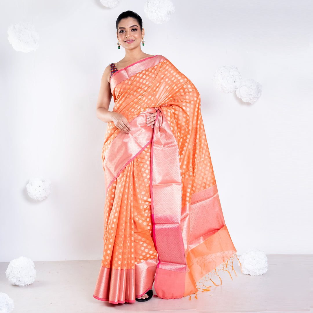 Women'S Banarasi Kora Organza Saree In Sunset Orange Color With Golden Border And Booti