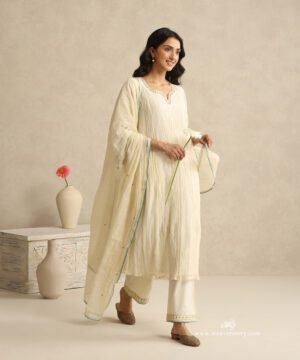 Ivory Handloom Mul Chanderi Suit Set With Hand Embroidery And Blue Piping