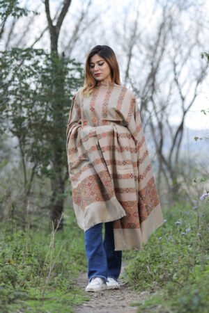 Steady Beige Colour Shawl With Flower Pattern Style Bold And Dense Border Gives Rich And Beautiful Look.