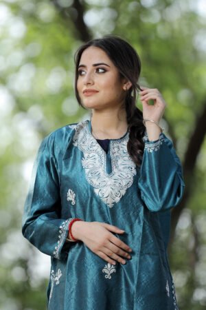 Teal Blue Colour Rayon Silk  Kurti With Beautiful Aari Embroidery Gives Attractive Look To The Wearer.