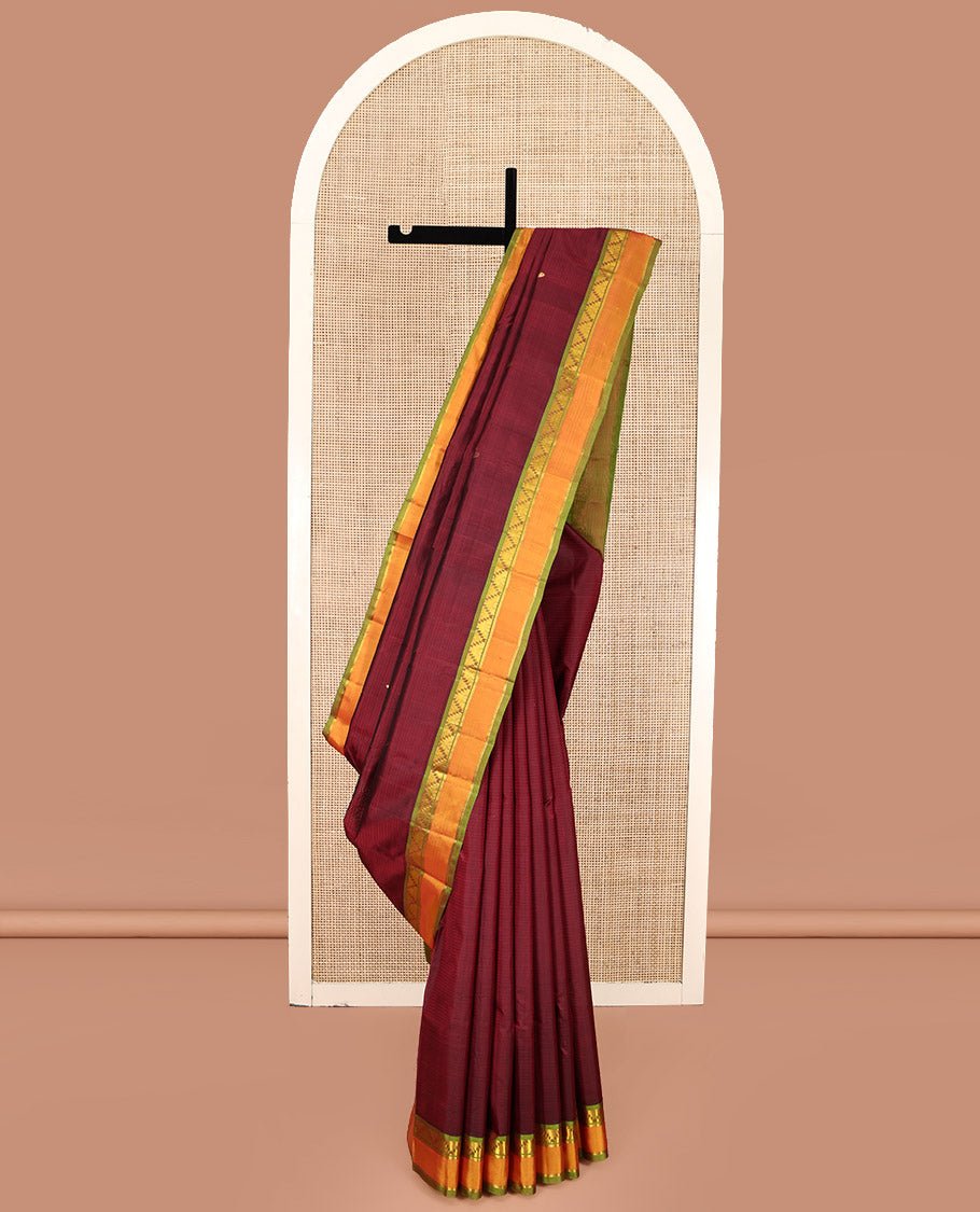 Maroon Kanchipuram Silk Saree, Sparsely Woven With Vazhaipoo Stripes And Buttas On Its Body, Complemented By Contrast Rettai Pettu Border Of Thazampoo Rekku, And Kathir Designs, Zari-Striped Pallu, And Paired With A Contrast Blouse