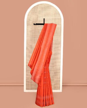 Orange Mayuri Soft Silk Saree, Subtly Sparkled With Buttas All Over Its Body, A Self-Border Of Thazampoo Rekku Designs, Sparsely Woven Pallu, And Paired With A Matching Blouse