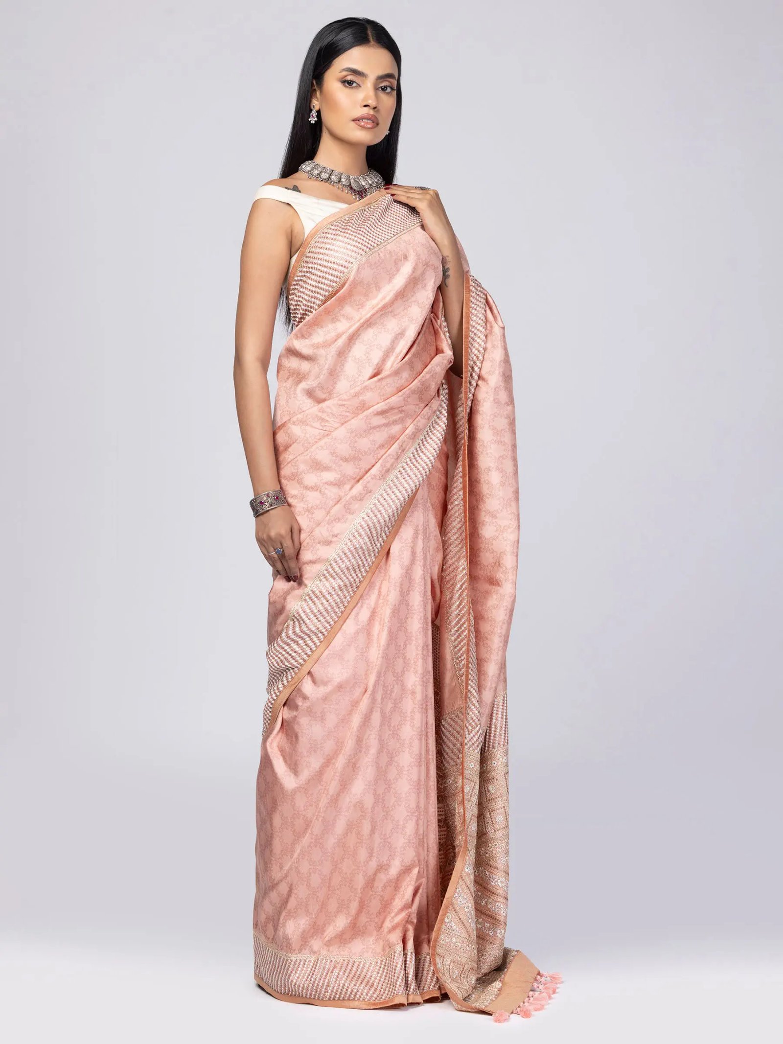 Peach Printed And Embroidered Silk Saree