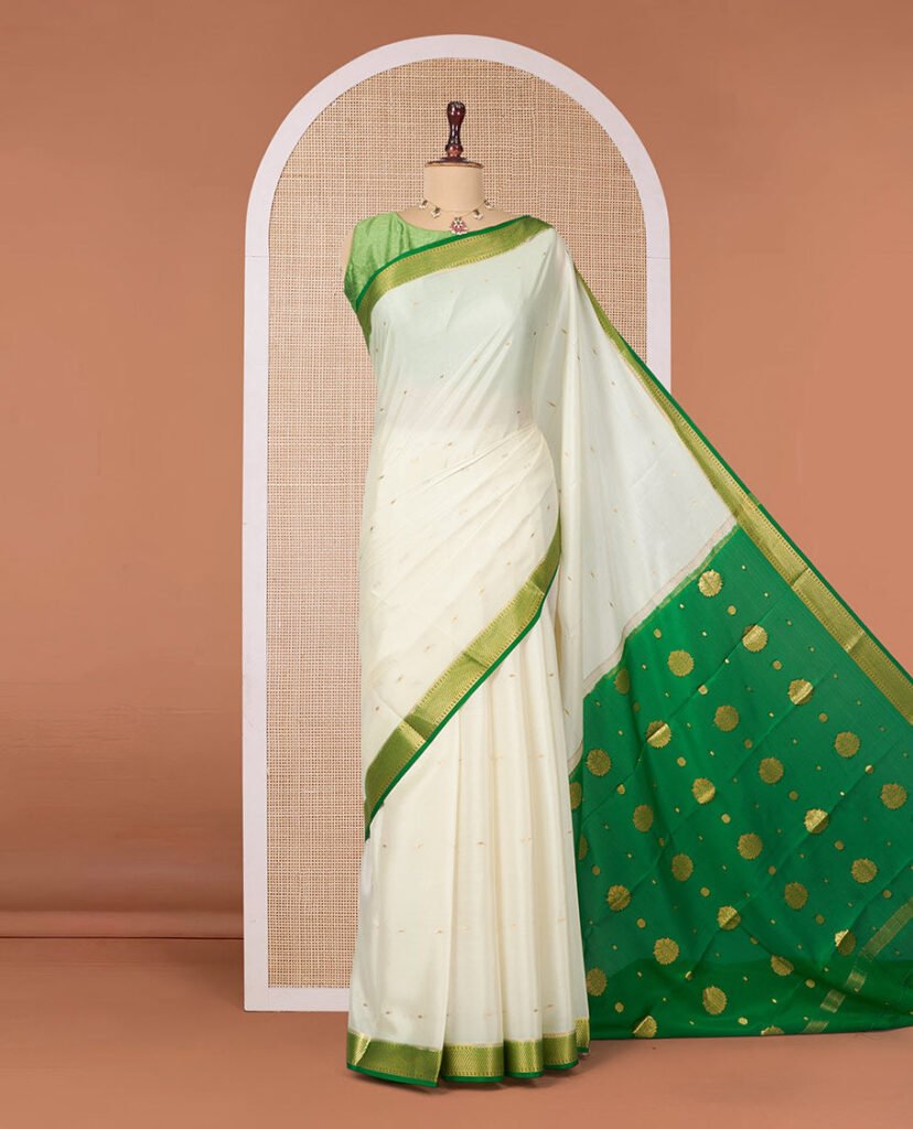 White Mysore Silk Saree, Ornamented With Zari Buttas All Over Its Body, Complemented By A Contrast Traditional Zari Design Border, Zari-Buttas Woven Pallu, And Paired With A Contrast Blouse by Pothys, South Asian ethnic wear