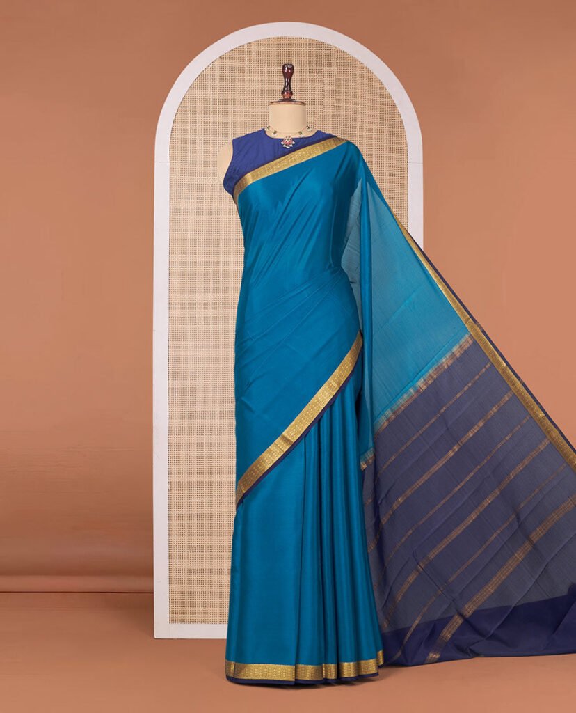 Peacock Blue Plain Mysore Silk Saree, Complemented By A Contrast Traditional Zari Design Border, Zari Striped Pallu, And Paired With A Contrast Blouse by Pothys, South Asian ethnic wear