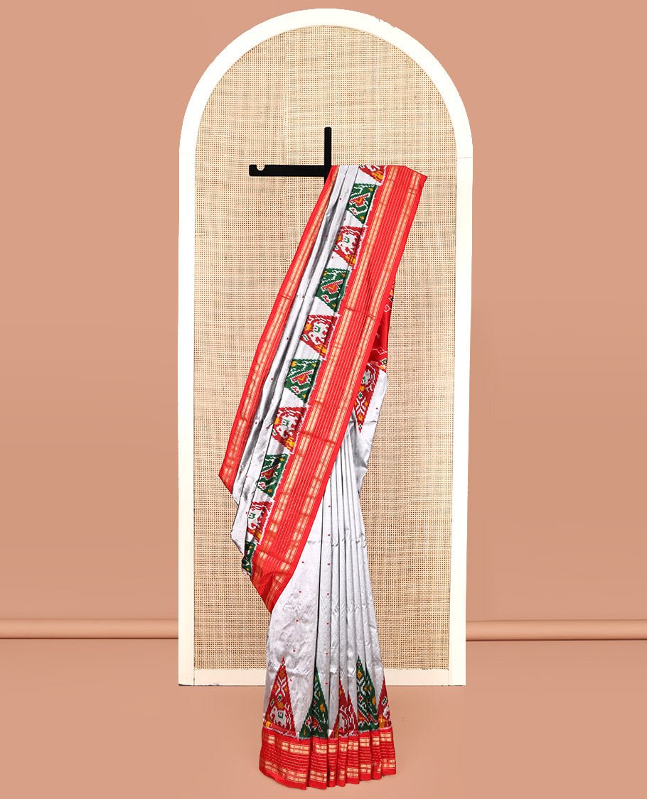 Grey Pochampally Ikat Silk Saree, Subtly Woven With Ikkat Buttas On Its Body, Complemented By A Contrast Temple Border Of Traditional Designs, Pallu Of Butta Enclosed Checks, And Paired With A Contrast Blouse
