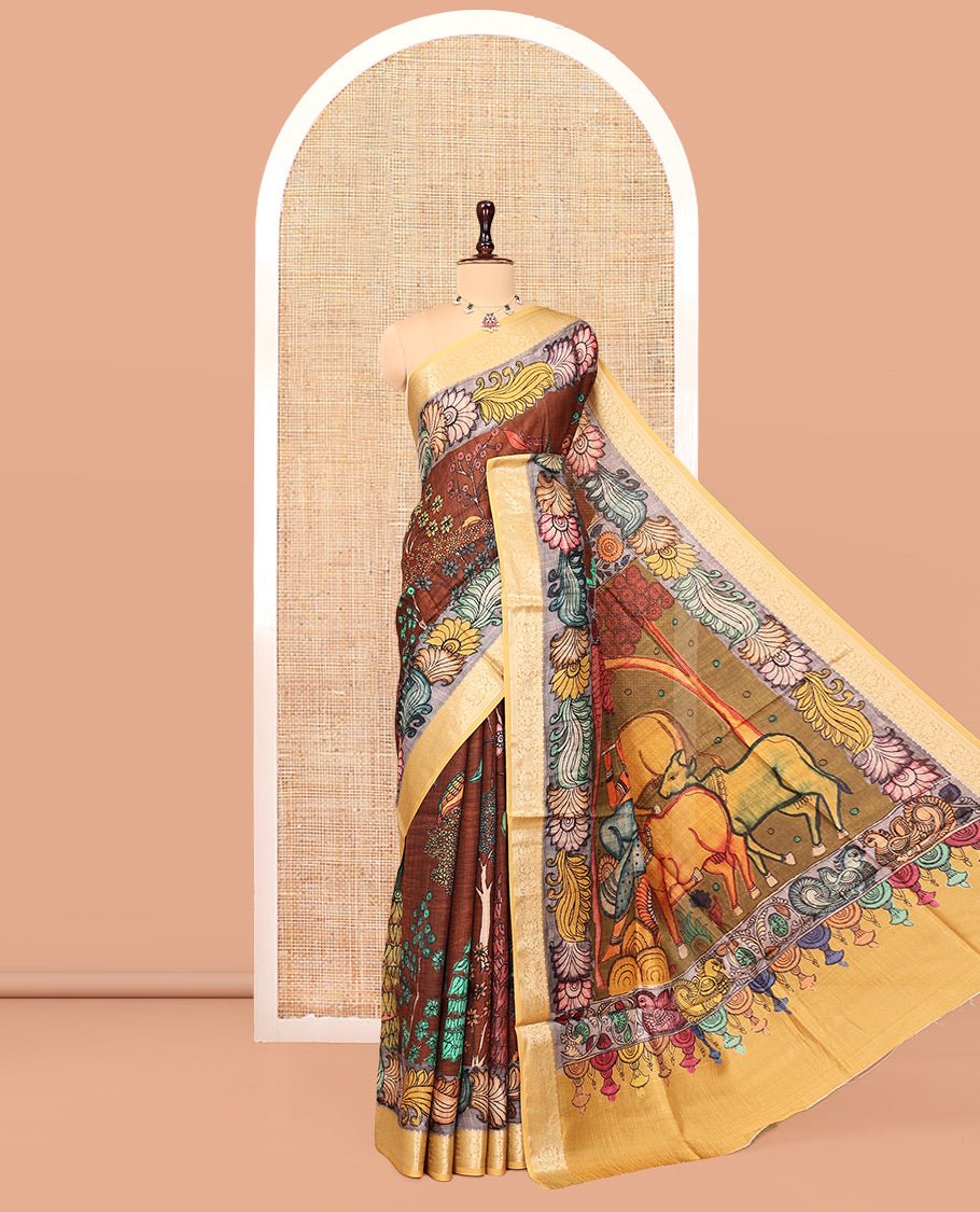 Brown Kalamkari Printed Semi-Banarasi Tussar Saree, Embellished With Floral Design, Contrast Border, Pallu Of Lord Krishna Design, And A Contrast Blouse