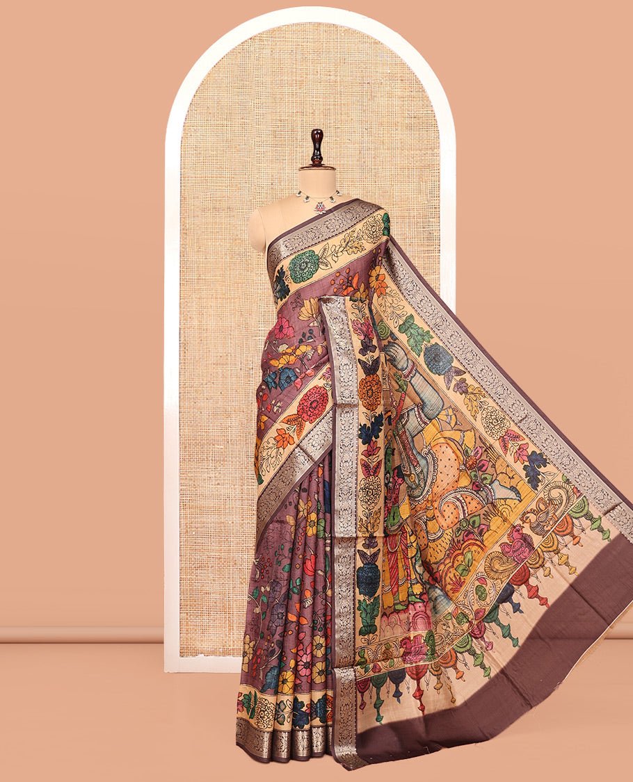 Brown Kalamkari Printed Semi-Banarasi Tussar Saree, Enriched With Floral Design, Zari Border, Contrast Lord Krishna Printed Pallu, And A Contrast Blouse
