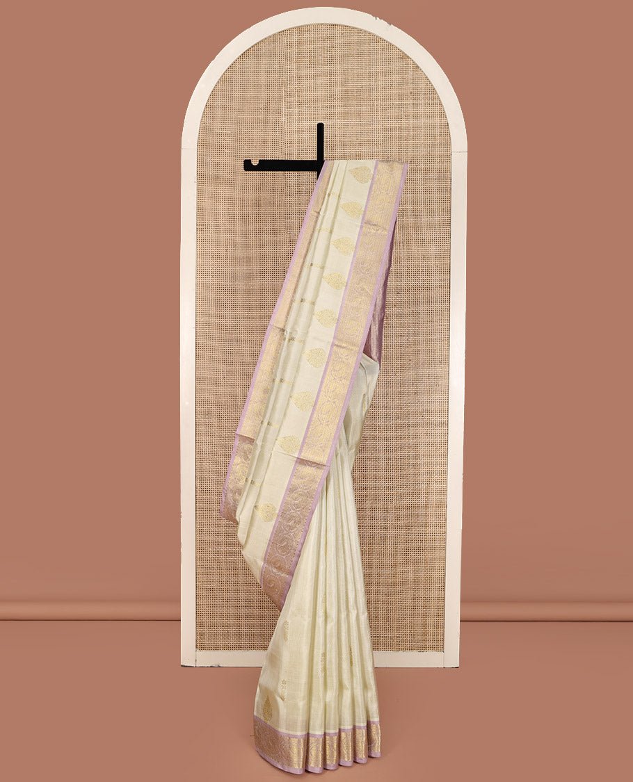 Off-White Venkatagiri Silk Saree, Spotlighted With Zari Buttas All Over Its Body, Complemented By A Contrast Traditional Zari Design Border, Grand Pallu, And Paired With A Contrast Blouse