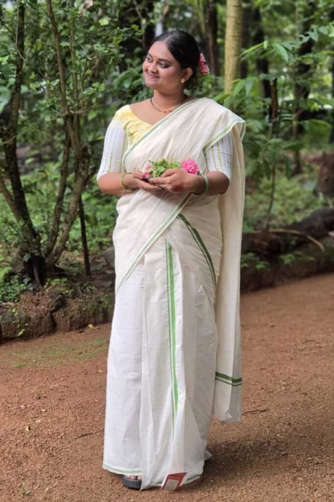 Puliyilakara Offwhite Set Saree Green by byhand, South Asian ethnic wear