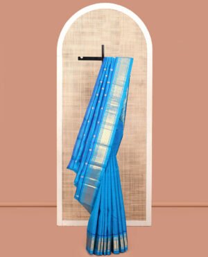 Blue Kanchipuram Silk Saree, Detailed With Zari Buttas, A One-Sided Border Featuring Panner Sombu, Banaras, And Jaal Design, Pallu Of Kodi Visiry, And No Blouse
