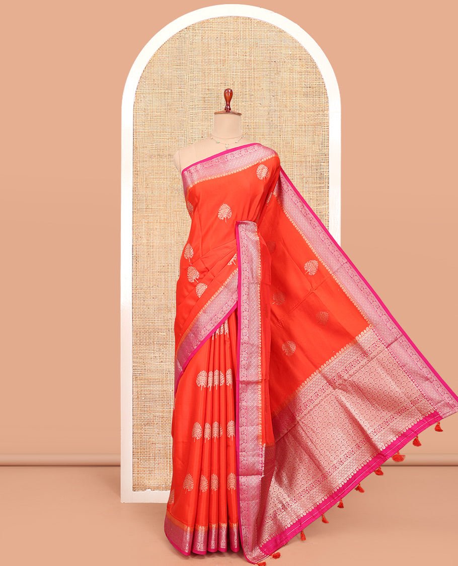 Orange Satin Silk Saree, Embellished With Tree Buttas All Over Its Body, Complemented By A Contrast Traditional Zari Design Border, Intricately Designed Pallu, And Paired With A Contrast Blouse