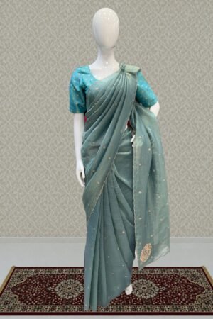 Sea Green Shimmer Tissue Saree With Scalloped Zari Border by Seasons Chennai, South Asian ethnic wear