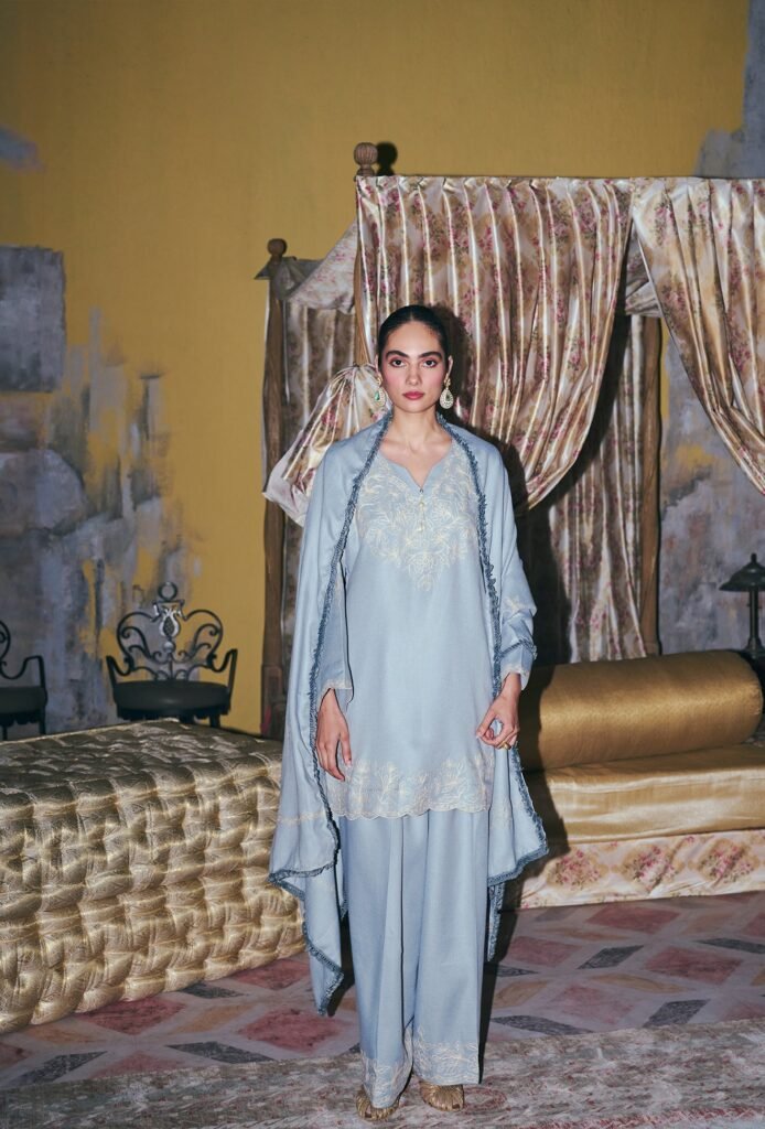 ⁠⁠cloud Blue Aari Embroidered Short Pheran Set With Farshi Salwar And Embroidered Stole by Koshur India, South Asian ethnic wear