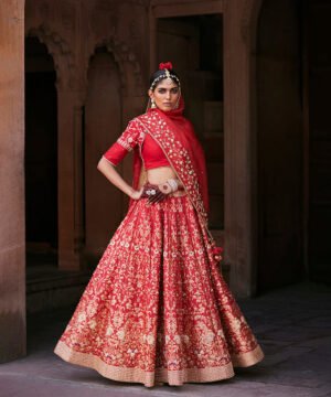 Red Hand Embroidered Zardozi Banarasi Lehenga With Raw Silk Blouse And Dupatta by WeaverStory, South Asian ethnic wear