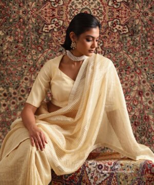 Solstice Offwhite Striped Tissue Saree With Chanderi Finishing by WeaverStory, South Asian ethnic wear