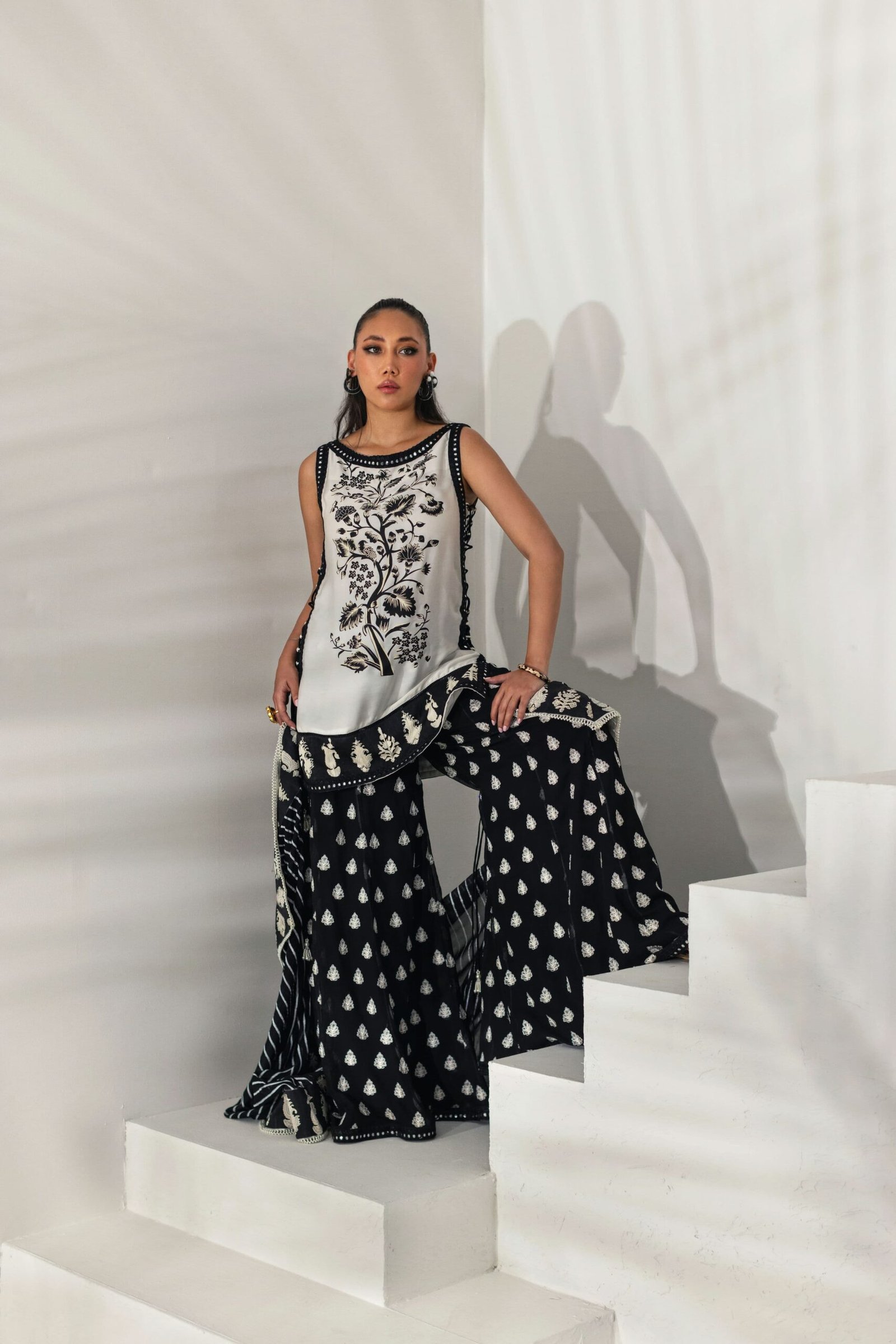 Monochrome Embroidered Tunic With Flared Palazzos by Shehrnaz, South Asian ethnic wear